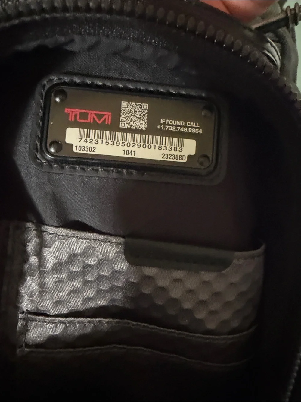 Tumi Black Roll-Top Backpack with Front Pockets